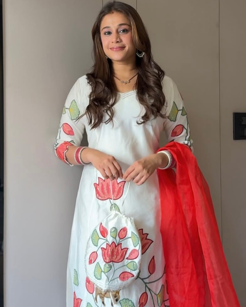 WHITE SUIT WITH POTLI