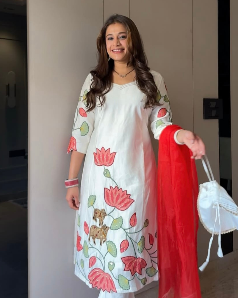 WHITE SUIT WITH POTLI
