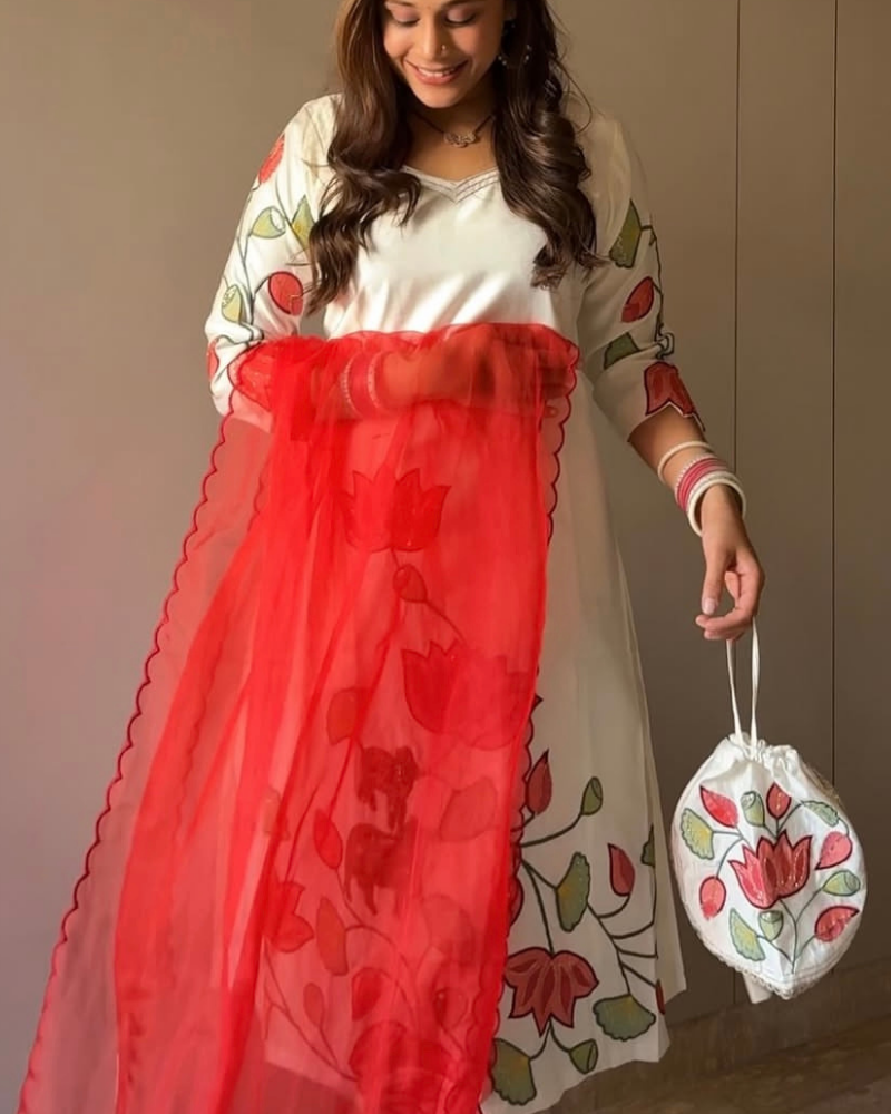 WHITE SUIT WITH POTLI